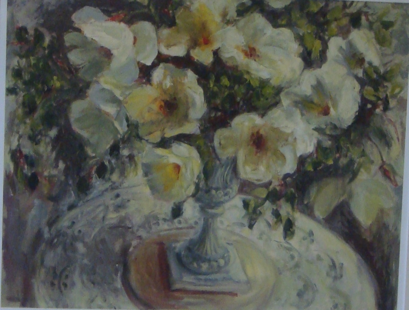 white roses in vase